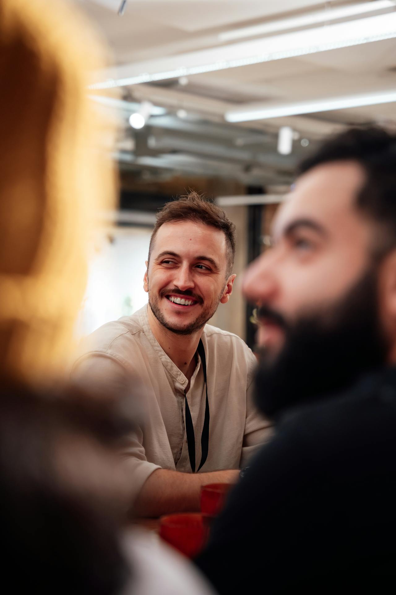 Clinician engaging warmly in a team setting