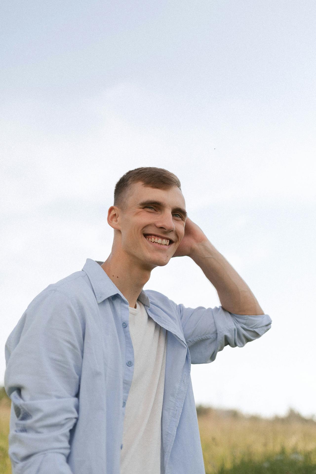 Person smiling outdoors, moving forward