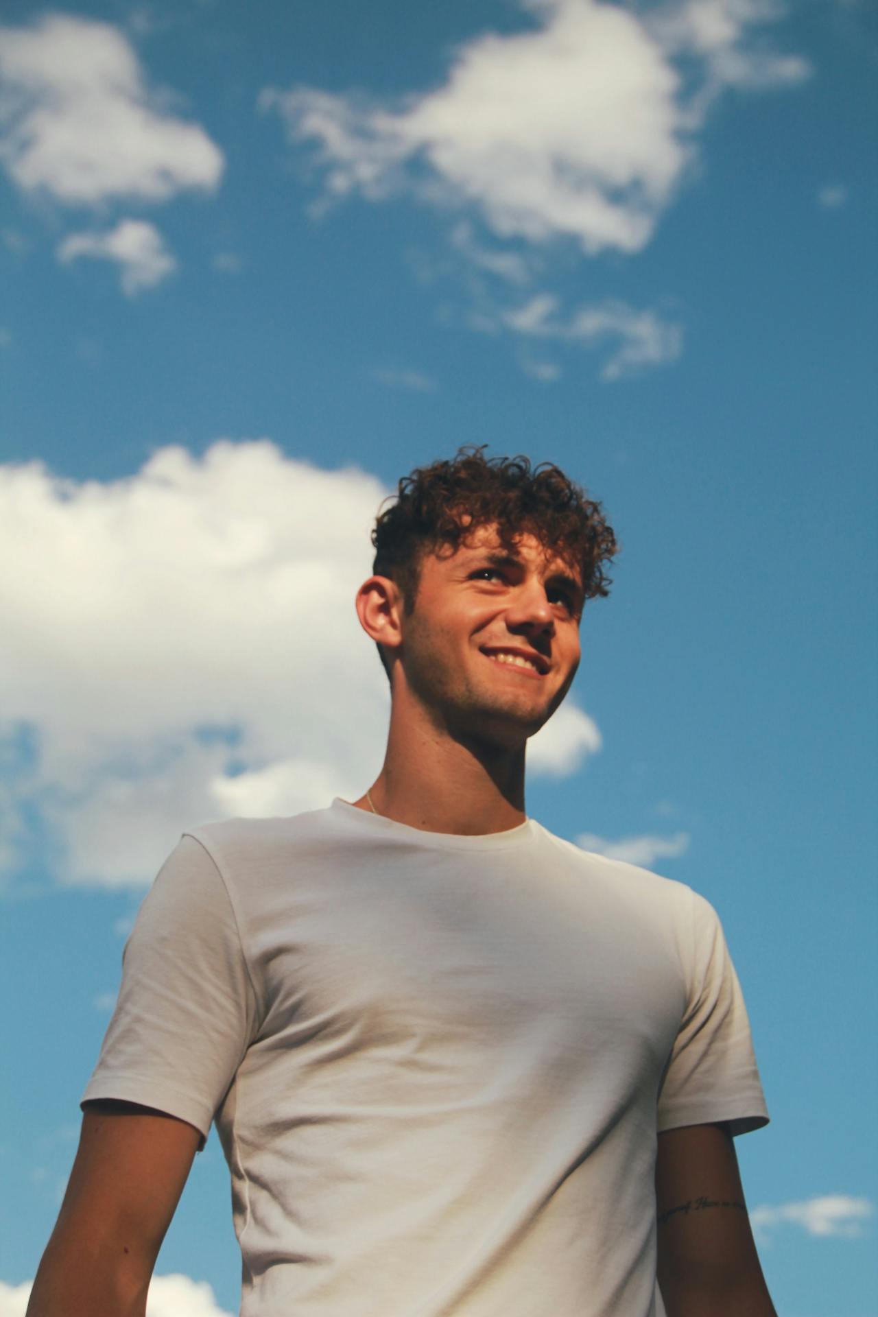 Person looking up at the sky — applying skills and building confidence in real life